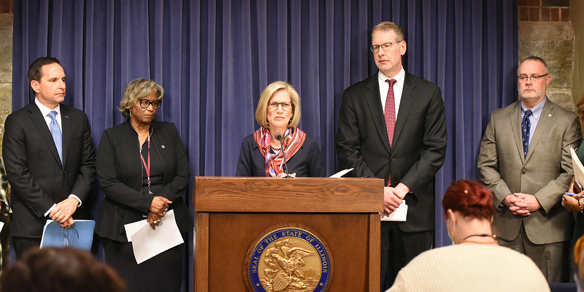 Sen. Suzy Glowiak Hilton address reporters in Blueroom