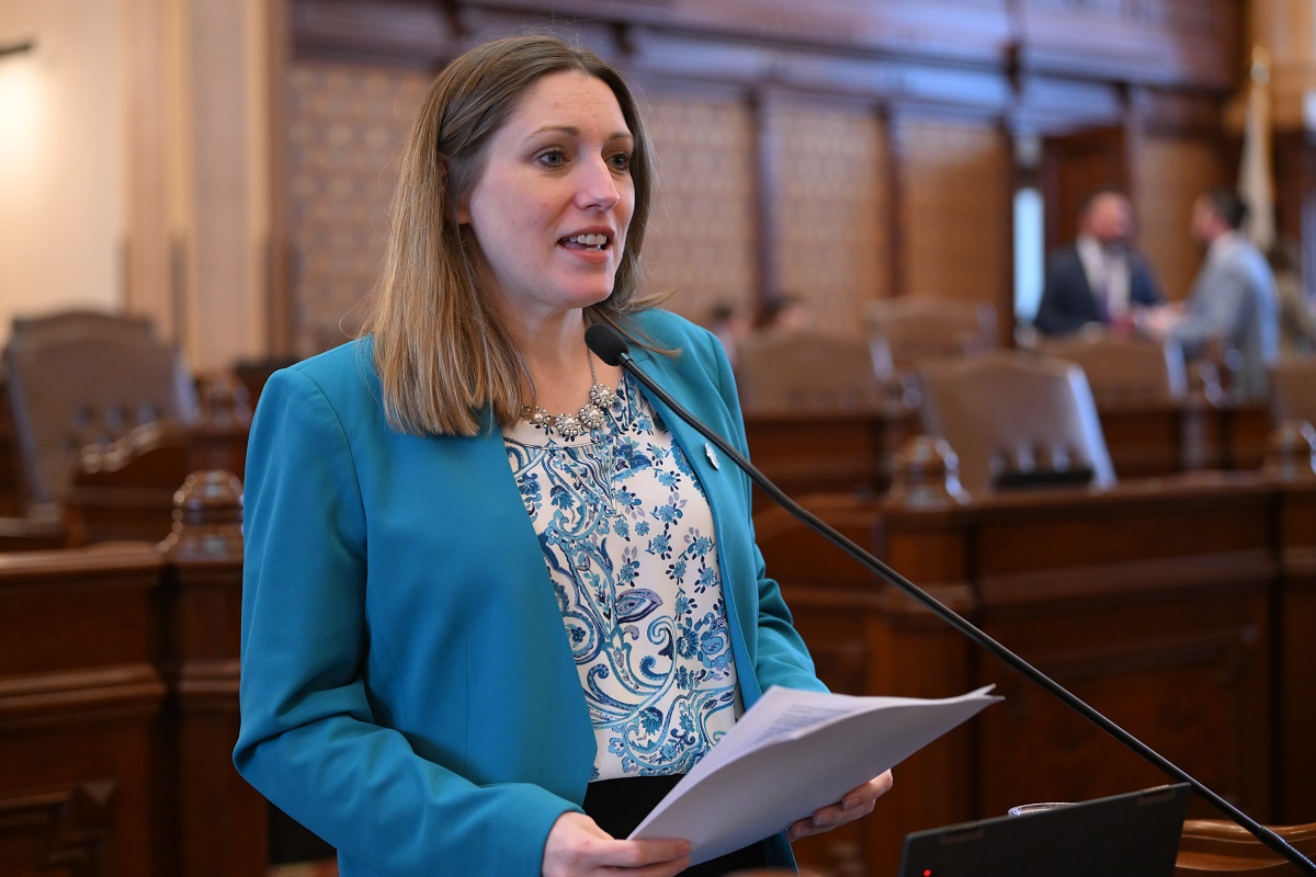 Senator Ventura speaks at a podium