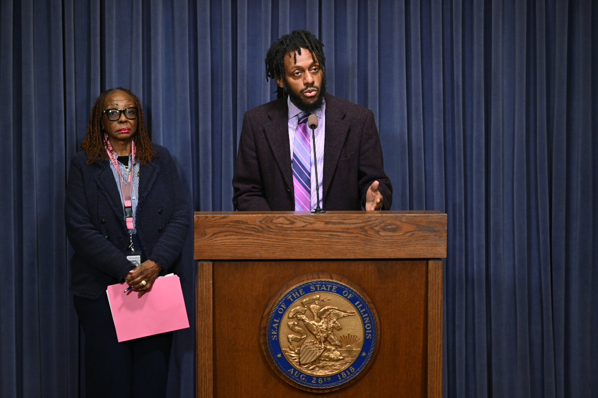 State Senator Mike Simmons speaks at a press conference