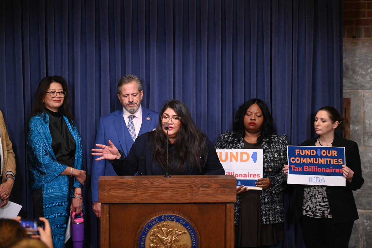Senator Guzman speaking at a press conference