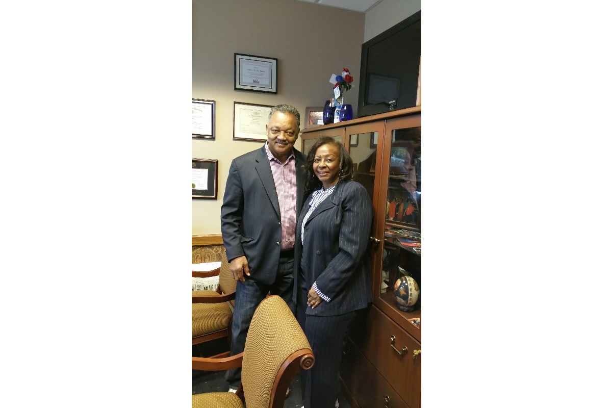 State Senator Mattie Hunter stands with Rev. Jesse Jackson Sr.