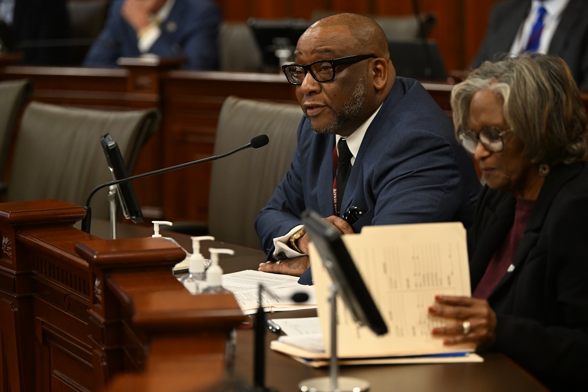 State Senator Christopher Belt speaks in a committee