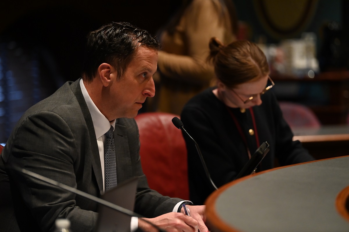 State Senator Michael E. Hastings speaks in a committee