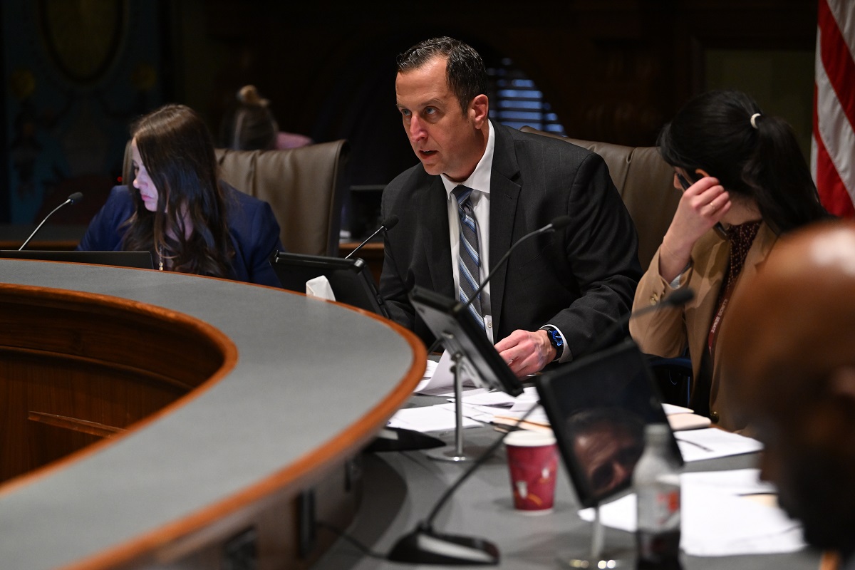 State Senator Michael E. Hastings speaks in a committee